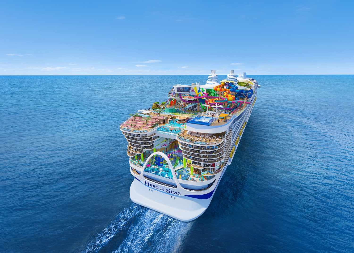 Hero of the Seas cruise ship sailing on the open ocean at golden hour